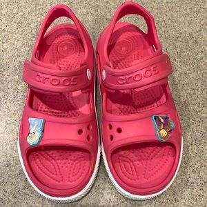 Pink Crocs sandals
